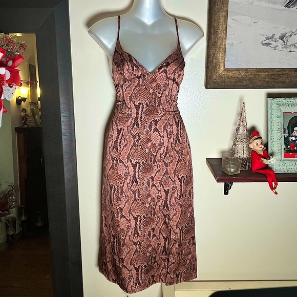 Express Dresses & Skirts - Express brand women’s snake print dress. Size small. EUC! Midi-length. Polyester